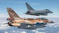 F-16 und Eurofighter in der Luft nebeneinander