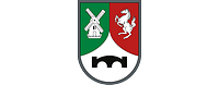 Wappenfarben Grün, Rot und Silbern, darauf silberne Windmühle, aufsteigendes Ross, Pionierbrücke.
