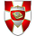 Ein Wappen mit roter Grundfarbe, darauf eine Eisernes Kreuz. Darüber ein Schild mit einem Buch und der Weltkugel. 