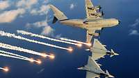 Zwei Eurofighter verschießen in der Luft Täuschkörper, sogenannte Flares