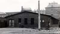 Monochrome picture of an old flat building