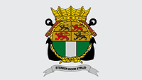 Ein rundes Wappen, horizontal zweigeteilt; oben vier Löwen, unten drei senkrechte Streifen Grün-Grau-Grün.