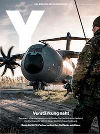 Das Cover der "Y", im Motiv ist ein Transportflugzeug vom Typ A400M, davor steht ein Soldat.