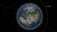 Die Grafik zeigt die Erde und eine halbe Million Objekte, größer als ein Zentimeter, im erdnahen Orbit.
