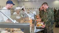 Service members pick up their meals in a Bundeswehr dining facility