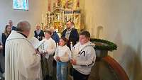 Taufe von Sören, Lotta und Thea in der St. Hieronymus Kirche in Dahlem 