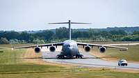 An American C-17 landing.