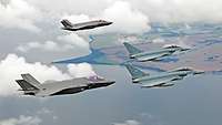 A four-ship formation consisting of two Eurofighters and two F-35s.