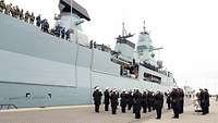 The ‘Naval Band Wilhelmshaven’ in front of frigate Hessen