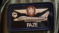  A soldier's name tape can be seen with the callsign "Faze".