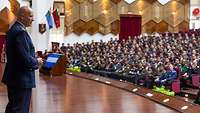  Hundreds of Indian officer candidates sit in a lecture room