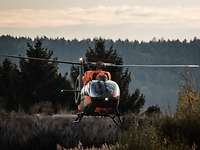 The light support helicopter in low-altitude flight over open terrain