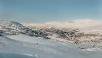 Snow-covered mountains in northern Norway. 